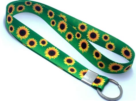 Cordão De Fita Com Desenhos De Girassóis - Cordão de girassóis é identificação oficial no Brasil de pessoas com ...