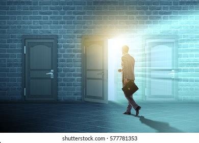 Businessman Walking Towards Open Door Stock Photo Shutterstock