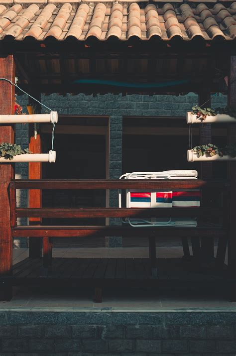 Wooden pergola with tiled roof · Free Stock Photo