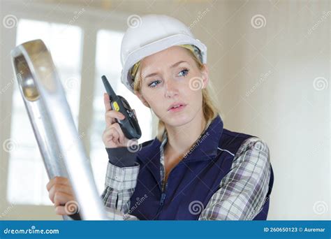 Female Architect Talking on Walkie- Talkie Stock Image - Image of gesture, builder: 260650123