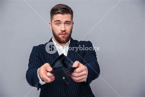 Businessman Displaying His Empty Wallet Royalty Free Stock Image