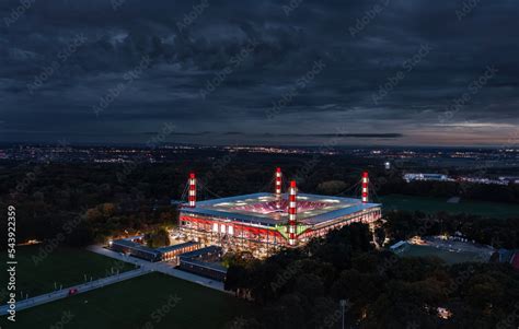 Night aerial view of the illuminated RheinEnergieStadion (Müngersdorfer ...