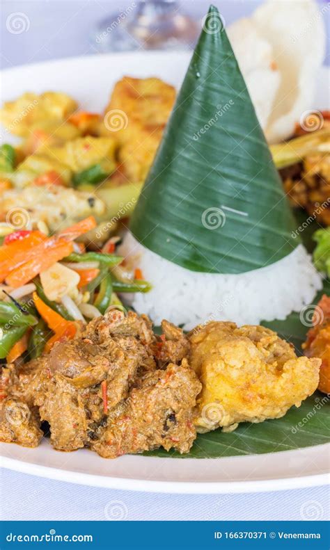 Nasi Campur Bali Served on a Banana Leaf Stock Image - Image of ...