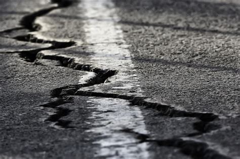 Premium Photo | Asphalt in cracks texture / abstract background cracks on asphalt road