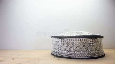 White Islamic Caps with Black Patterns are Usually Worn by Muslim Men ...