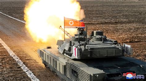 North Korea’s Kim Jong Un ‘drives’ new tank during mock battle | World ...