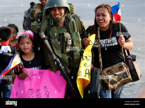 Relatives Welcome Home Troops In One Of The First Battalions To Be