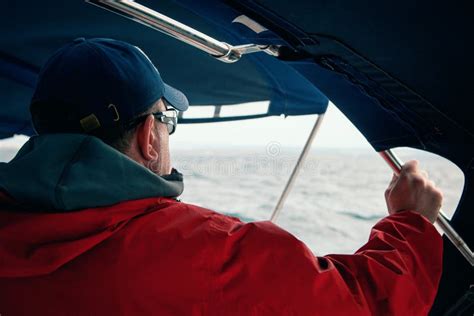 The Captain On The Boat Looking At The Sea Straight Ahead Editorial