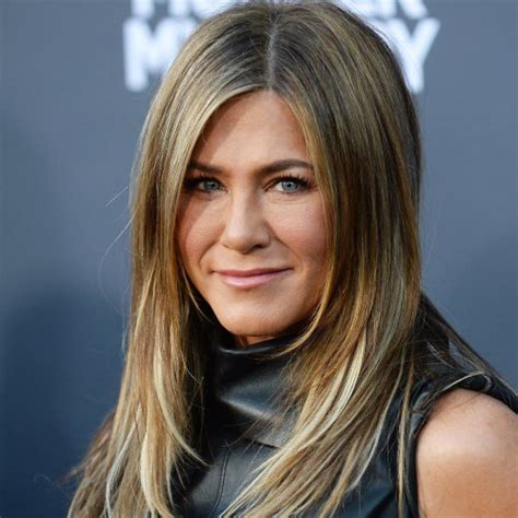 Jennifer Aniston Strips Down To A Robe With Her Natural Curls On