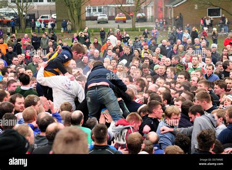 Ashbourne Traditional Shrovetide 2 Day Football Match Stock Photo - Alamy