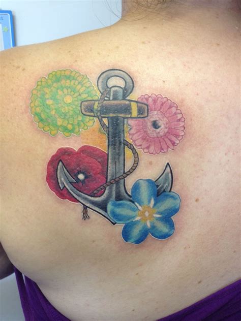 Anchor tattoo with flowers for each of my grandparents | Anchor flower ...