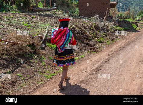 Peruvian Indigenous Quechua Woman In Traditional Textile Clothing