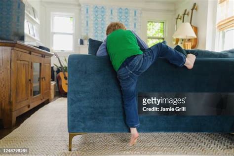 Kid Climbing Over Photos And Premium High Res Pictures Getty Images