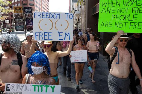 Men Join Women To Strip Down For The Annual GoTopless Day Parade In