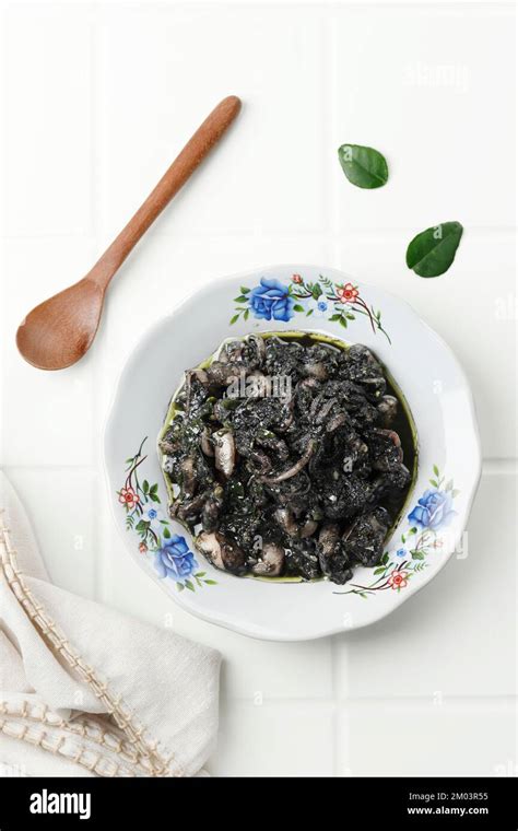 Tumis Cumi Hitam Or Stir Fried Squid In Black Ink Sauce Traditional