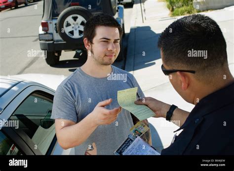 Police Officer Writing Ticket Stock Photo Alamy