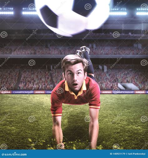 Soccer Player Jumping For A Header On Fotball Field Stock Image Image