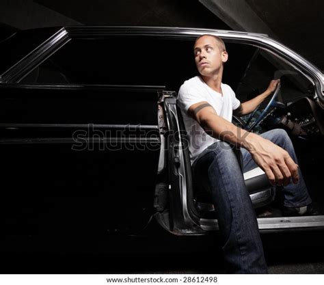 young man exiting  vehicle   royalty  licensable stock