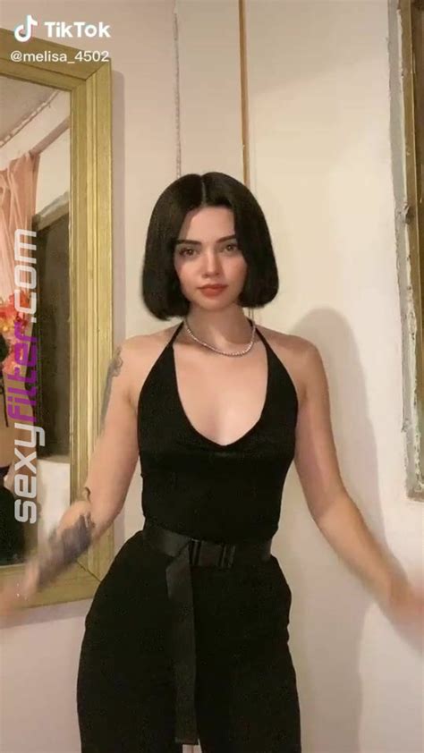 Cute Melisa Ruiz Shows Cleavage In Black Dress