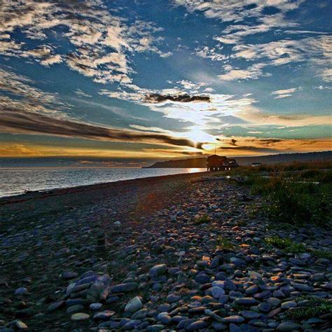 Looking down the beach at sunset in Homer, Alaska