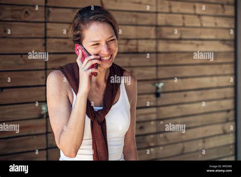 Mature Woman Talking On Smart Phone Stock Photo Alamy