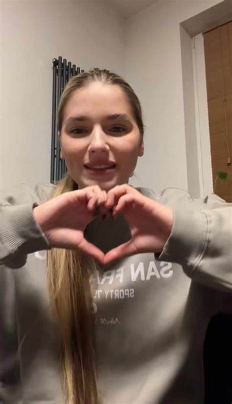 A Girl Making A Heart With Her Hands