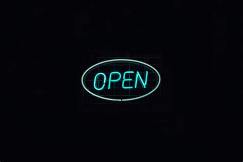 Open Neon Signage on the Wall · Free Stock Photo