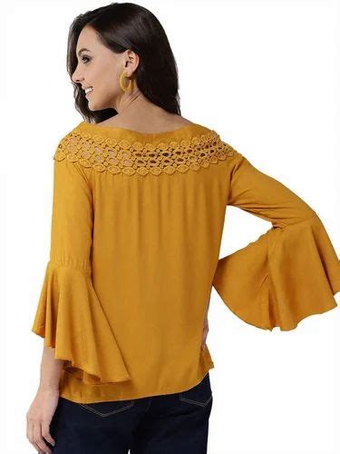 Stylish Viscose Rayon Mustard Yellow Solid Top For Women At Rs 750 00