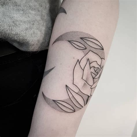 Stylized arrow and crescent moon tattoo - Tattoogrid.net