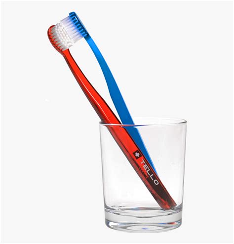 Two Tellos Toothbrush In A Glass Glass With Toothbrush Png