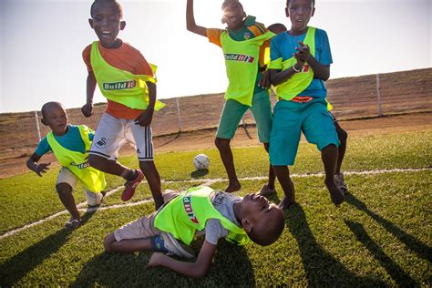 Playing Soccer In An African Village Micato Luxury Africa Safaris