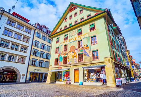 Panorama Of Weinmarkt Square With Historical Ornate Guild Houses With Frescoes On March 30 In