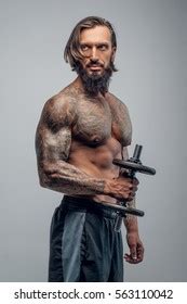 Shirtless Bearded Male Tattooed Body Holds Stock Photo 563110042