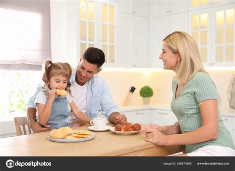 Happy Family Eating Together Table Modern Kitchen Stock Photo by ...