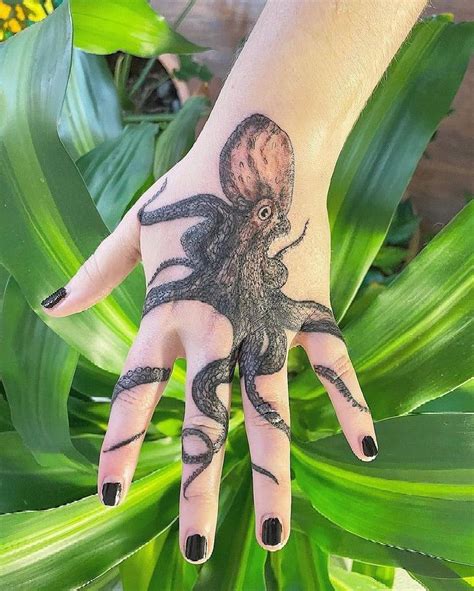 Mesmerizing Octopus Hand Tattoo