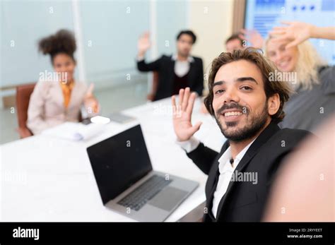 A Diverse Group Of Young Business People Taking Selfies In The