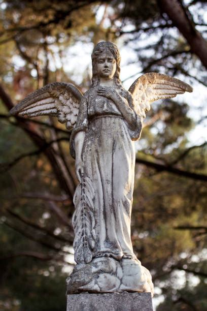 Sad Angel Statue Background Stock Photos, Pictures & Royalty-Free Images - iStock