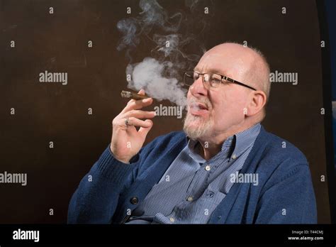 Old Man Smoking Cigar Hi Res Stock Photography And Images Alamy