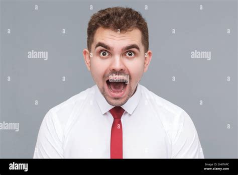 Surprised man open mouth portrait hi-res stock photography and images ...