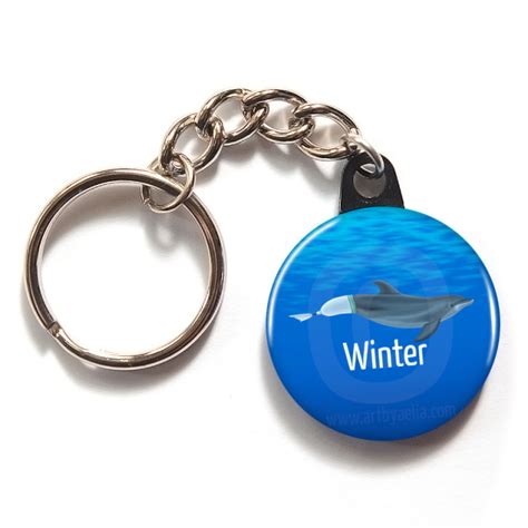 Dolphin Button or Keychain - Winter with Prosthetic Tail