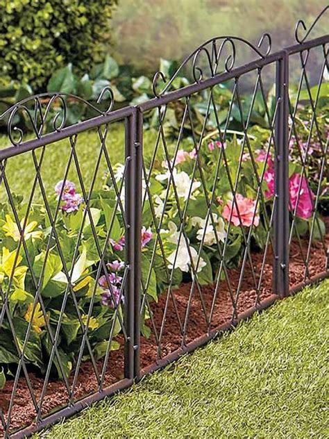 11 Garden Fence Ideas That Will Complement Any Landscape Metal Garden Fencing Garden Fencing