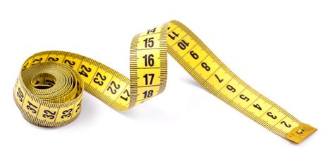 yellow measuring tape isolated  white background stock photo