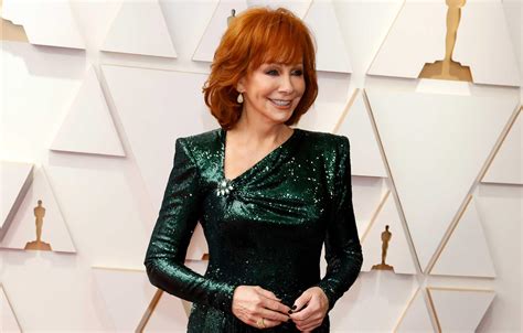 Reba McEntire Is 'Pressing Dolly Parton's Buttons': Inside The Rivalry