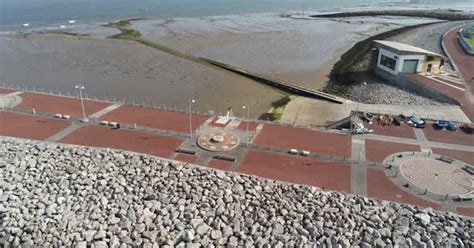 Aerial Rotating View Of Morecambe Seaside Town Long Historic Pier At