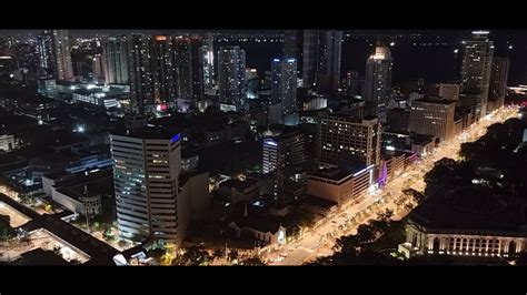 PHILIPPINES MANILA ERMITA SKYLINE AND KALAW AVENUE AT NIGHT APRIL 3