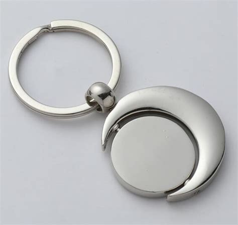 Moon And Sun Rotate Keyring Giftarget Inc