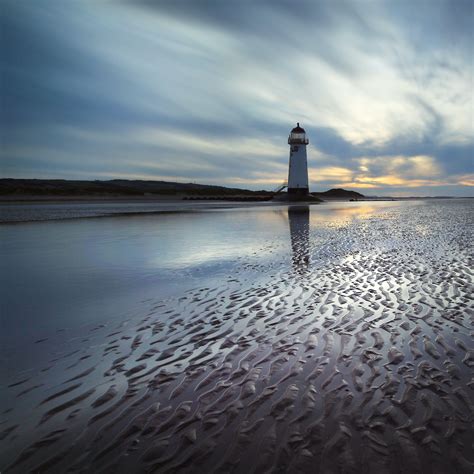 Lighthouse Near Body Of Water · Free Stock Photo