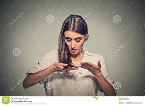 Unhappy Frustrated Young Woman Surprised She Is Losing Hair Stock Image