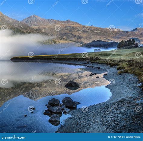 Mountain Lake At Sunrise In Autumn Landscape With Lake Gold Sunlight