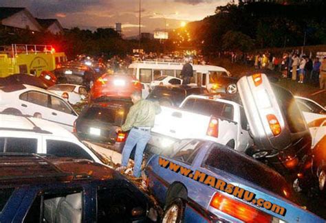 Car Pile Up - This Car Pile-up Comprised Of At Least 50 Cars